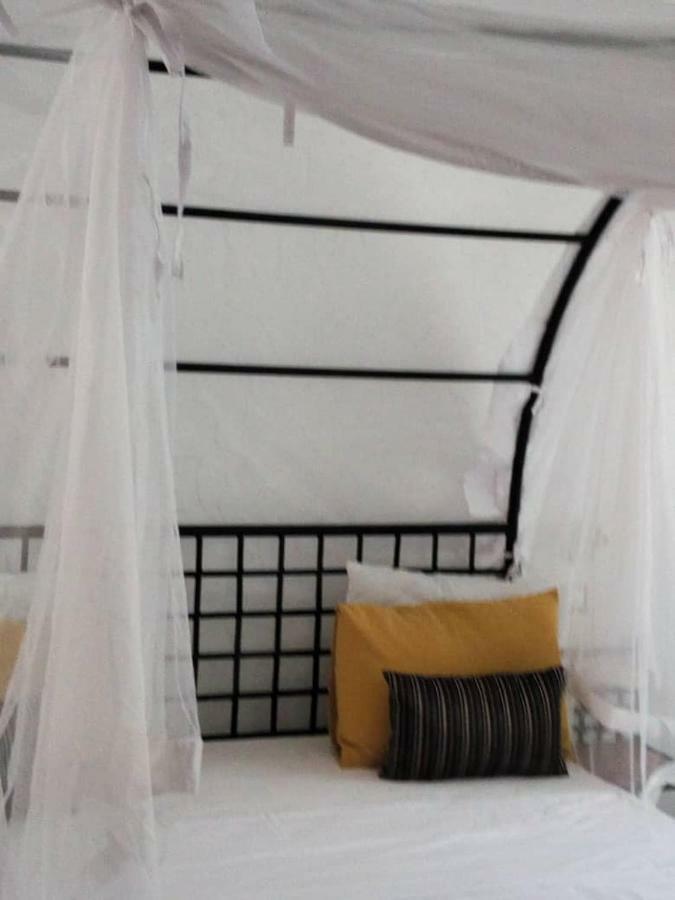 Le Calao Du Lac Rose Niaga Ngoại thất bức ảnh